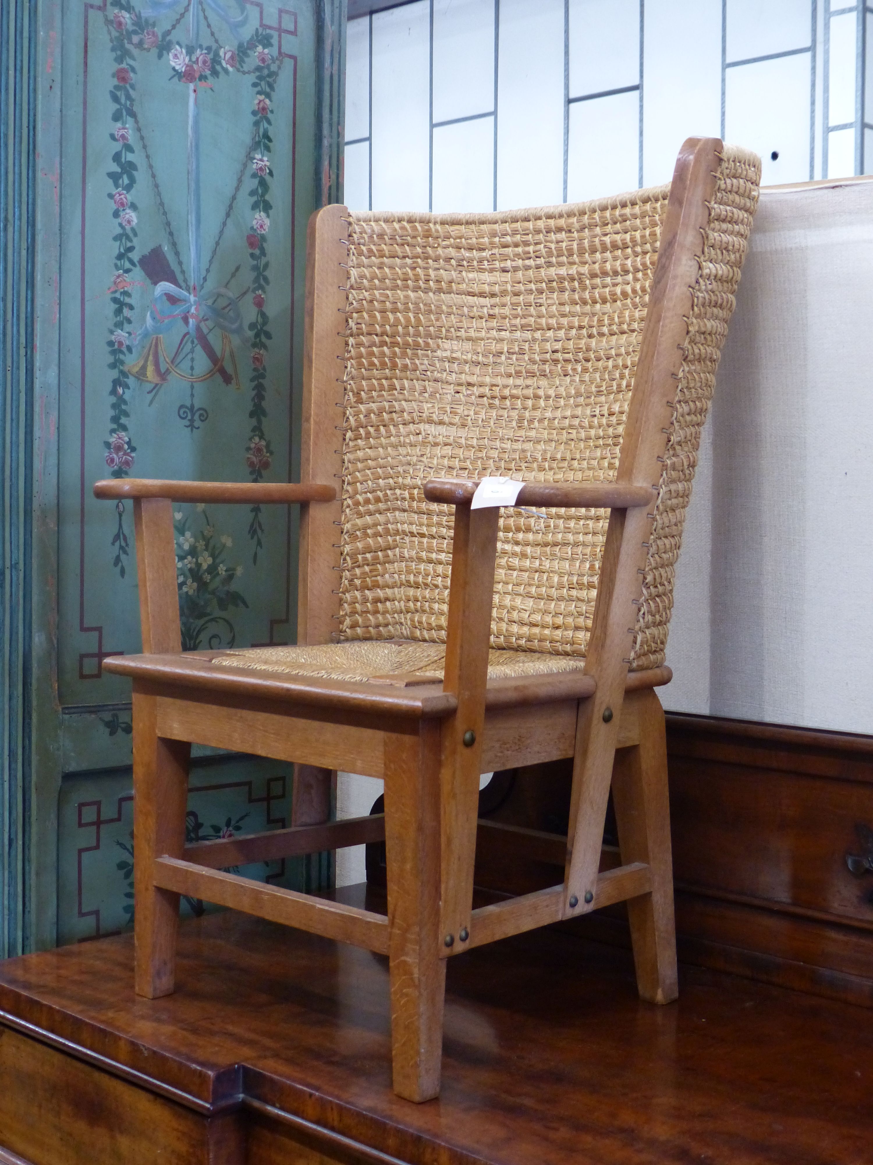 A 20th century light oak and skep work child's Orkney chair in traditional style, width 54cm, depth 56cm, height 84cm